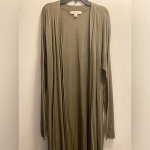 Size -XL condition-Great never worn. Sparkle green cardigan Long